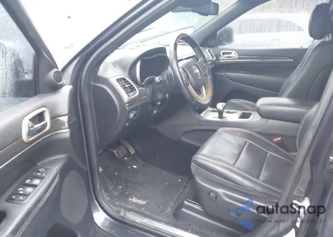 2014 Jeep Grand Cherokee Overland z USA, uszkodzony, nr VIN 1C4RJECTXEC330841